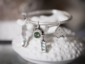 Teawitched Party Bracelet - The teacup features a gorgeous green moissanite diamond.