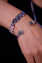 Pawlaris - A cuff from the celestial den
