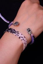 Pawlaris - A cuff from the celestial den