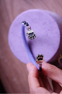 Pawlaris - A cuff from the celestial den